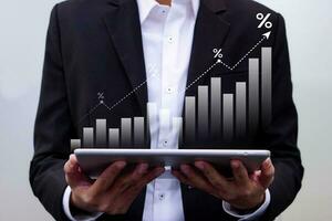 Business finance data analytics graph, profit and finance performance on virtual screen. Finance and technology concept. photo