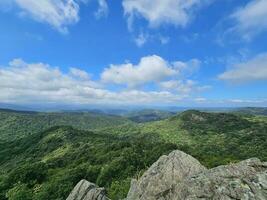 the beautiful panorama from the adelasia fortress, in the adelasia forest park in ferrania in the valbormida in liguria in the hot summer season of 2023 photo