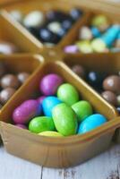 multi-colored sweet candies in a box photo