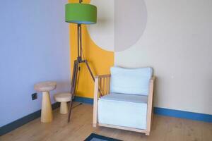 retro vantage armchairs with a lamp at home . photo