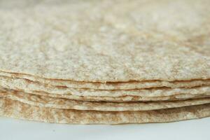 homemade roti chapati on table . photo