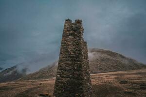 Tower in the mountains. photo