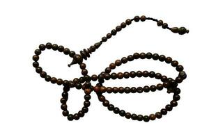 Tasbih oud solid wood for pray to allah to muslim religion photo