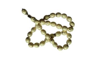 Tasbih oud solid wood for pray to allah to muslim religion photo
