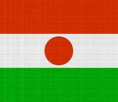 Flag of Republic of Niger on a textured background. Concept collage. photo