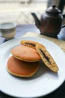 Dorayaki. Japanese bean paste pancake on a white background. Dorayaki is a cake that comes from Japan photo