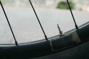 valve cap. wheel inflation valve on a bicycle. photo