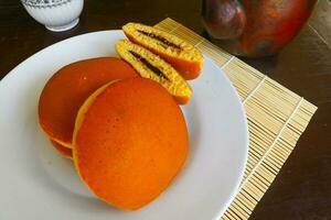 Dorayaki. Japanese bean paste pancake on a white background. Dorayaki is a cake that comes from Japan photo