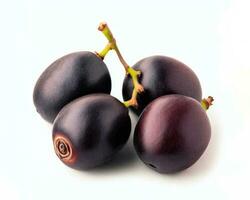 three of acai berries on white background photo