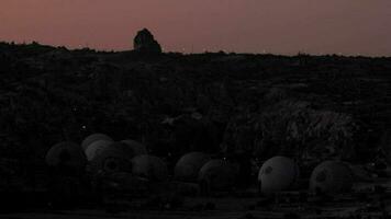 Preparations for Inflating Hot Air Balloons at Night Before Sunrise video