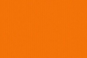 Texture of a knitted fabric of autumn mood. Cozy orange knitting pattern. Vector background for seasonal banners