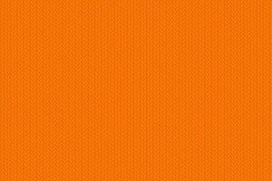 Texture of a knitted fabric of autumn mood. Cozy orange knitting pattern. Vector background for seasonal banners