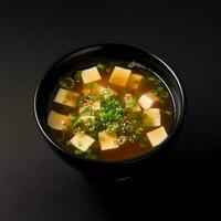 Food photography of Miso Soup on black bowl isolated on dark background. Generative AI photo