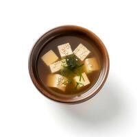 Food photography of Miso soup on black bowl isolated on white background. photo