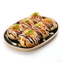 Food photography of takoyaki on plate isolated on white background. photo