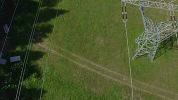 an aerial view of a power line and trees video