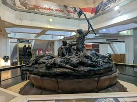 a statue of Indonesian independence warrior in 10 nopember museum. Surabaya, indonesia - may, 2023 photo