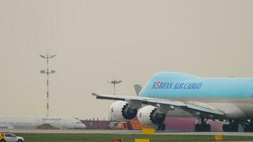 MOSCOW, RUSSIAN FEDERATION JULY 28, 2021 - Widebody aircraft boeing 747 Korean Air Cargo accelerate before departure at Sheremetyevo Airport, Moscow. Jumbo jet on the runway video