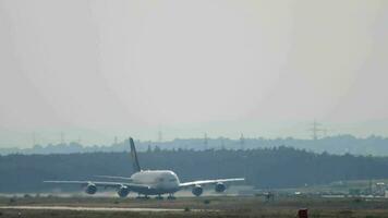 FRANKFURT AM MAIN, GERMANY JULY 17, 2017 - Huge double deck four engine passenger Airbus A380 of Lufthansa taking off at Frankfurt am Main airport, long shot. Tourism and travel concept. video
