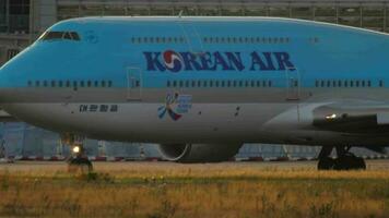 FRANKFURT AM MAIN, GERMANY JULY 17, 2017 - Korean Air Boeing 747 HL7637 flight KAL906 to Seoul taxiing before departure. Fraport, Frankfurt, Germany video