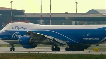 MOSCOW, RUSSIAN FEDERATION JULY 30, 2021 - Freight carrier of AirBridgeCargo taxiing at Sheremetyevo airport, side view. Cargo huge double deck aircraft on the taxiway video