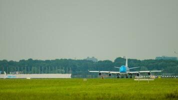 AMSTERDAM, THE NETHERLANDS JULY 27, 2017 - Passenger carrier of KLM Airlines on the runway picking up speed before takeoff. Passenger flight departing at Schiphol Airport, Amsterdam video