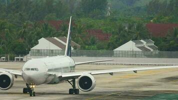 Passenger plane taxiing to the runway at the airport. Tourism and travel concept. video