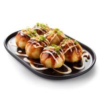 Food photography of takoyaki on plate isolated on white background. photo