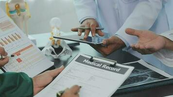 Doctors having a medical discussion in a meeting room video