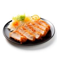 Food photography of Tonkatsu on black plate isolated on white background. photo
