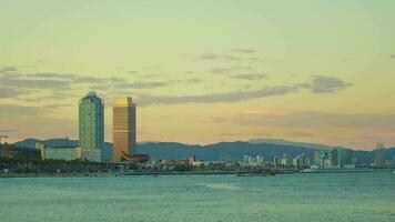 A city skyline reflected in a serene body of water video