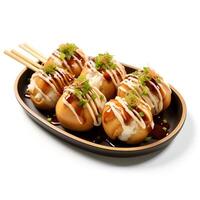 Food photography of takoyaki on plate isolated on white background. photo