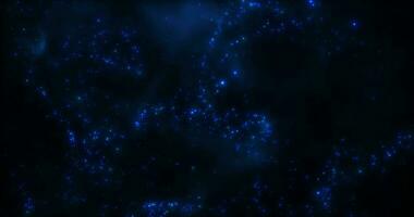 Abstract cloud of glowing dust particles and dots, particle stream, space scene with sparkling stars, bokeh effect. Blend of Glitter. animation. Seamless loop 4k video