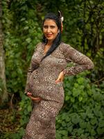 Pregnant woman posing in nature photo