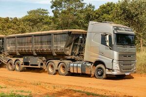 Apore, Goias, Brazil - 05 07 2023 trailer truck with trailer for transporting grain photo