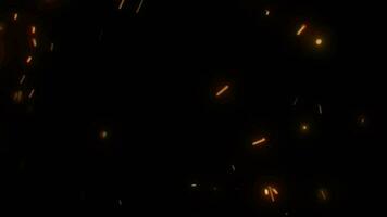 particles in motion. christmas lights background. fire in the night on a black background video