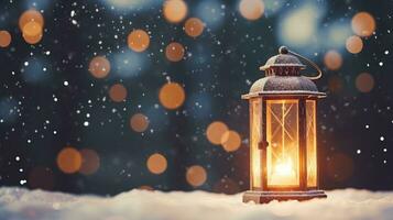 Christmas lantern with snowfall photo