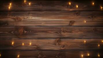 Brown dark wooden background with christmas lights photo