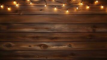 Brown dark wooden background with christmas lights photo