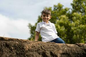 boy having fun outdoors photo