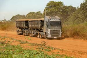 Apore, Goias, Brazil - 05 07 2023 trailer truck with trailer for transporting grain photo