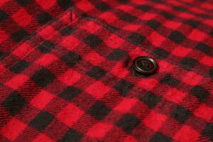 Background texture of red plaid flannel fabric photo