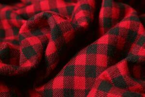 Background texture of red plaid flannel fabric photo