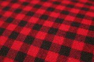 Background texture of red plaid flannel fabric photo