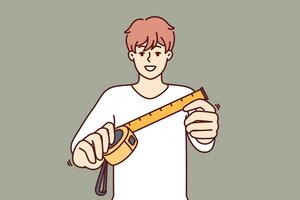 Man with measuring tape offers to find out exact size room to start repairing or building. Guy with measuring tape or ruler demonstrates dimension tool for accurate selection of furniture in apartment vector