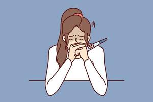 Frustrated pregnancy woman is crying holding pregnancy test with two strips and sitting at table. Concept pregnancy and need for family planning or problems associated with rejection of contraception vector