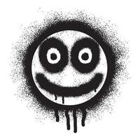 Smiling face emoticon graffiti with black spray paint vector