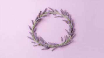 , wreath of lavender branches flowers with copy space, natural organic floral frame violet background photo