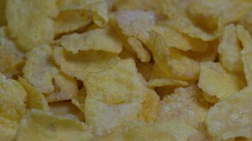 Close-up of Corn Flakes spinning, crispy cornflakes, healthy eating video