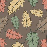 Seamless autumn pattern with colored oak leaves on a light background vector